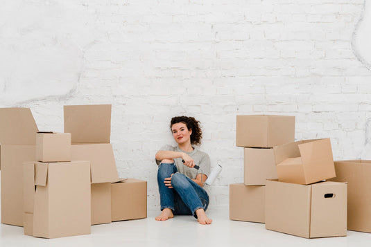 Stack of empty cardboard boxes left over after moving into a Southern California home