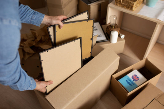 Framed pictures wrapped in bubble wrap and packed for a move in Los Angeles