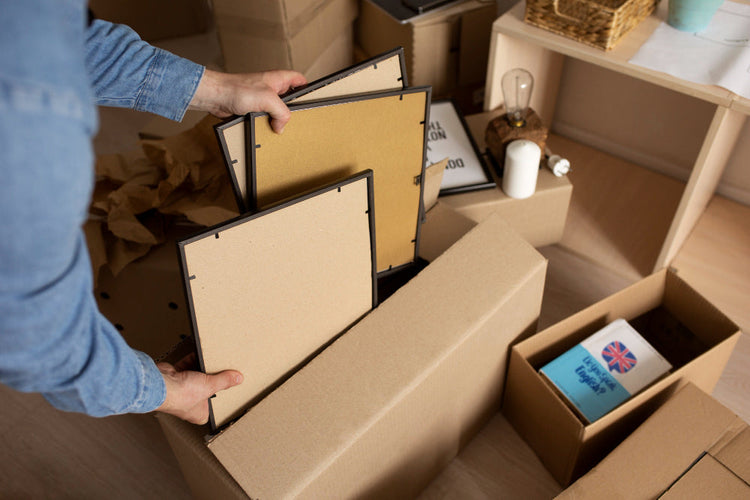Framed pictures wrapped in bubble wrap and packed for a move in Los Angeles