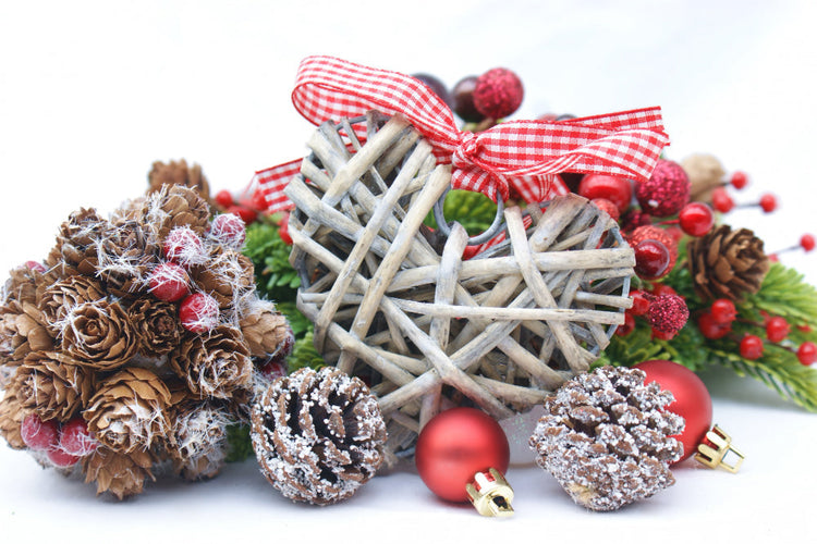 Holiday decorations and ornaments packed into labeled storage bins