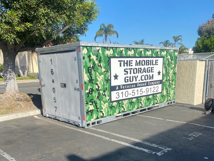 Long distance moving tips: couple organizing packed moving boxes before a cross-country move